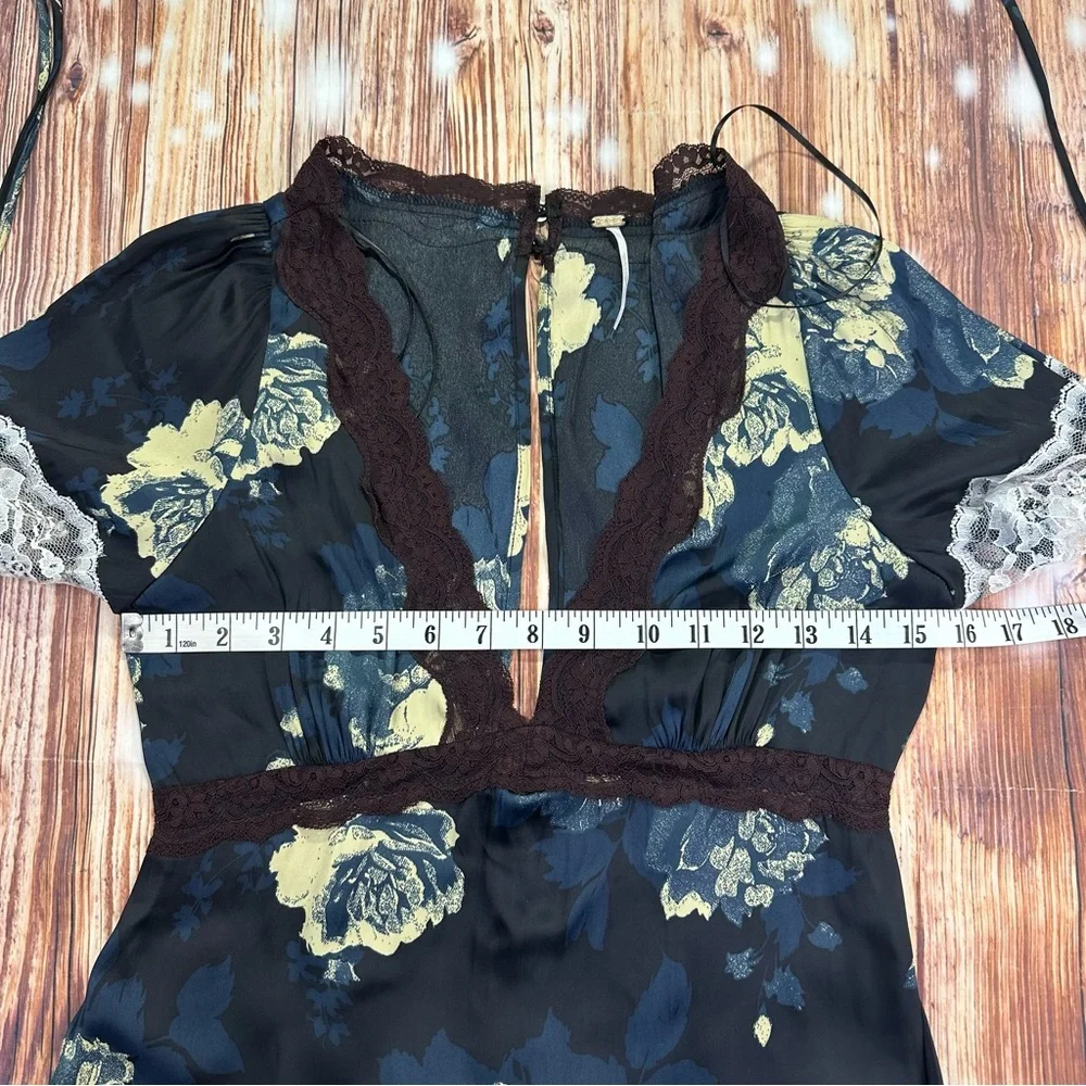 Free People Printed Mini Dress - Black Combo
Size Small - Picture 7 of 15